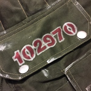 Here's my serial number inscribed on a pocket flap.
